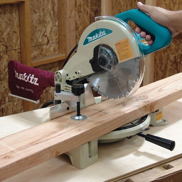 Ручна торцювальна пила без протяжки по дереву Makita LS1040N : 1650 Вт, глибина різу 93мм, круг 255 мм LS1040N фото