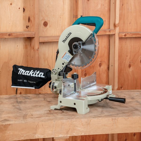 Ручна торцювальна пила без протяжки по дереву Makita LS1040N : 1650 Вт, глибина різу 93мм, круг 255 мм LS1040N фото