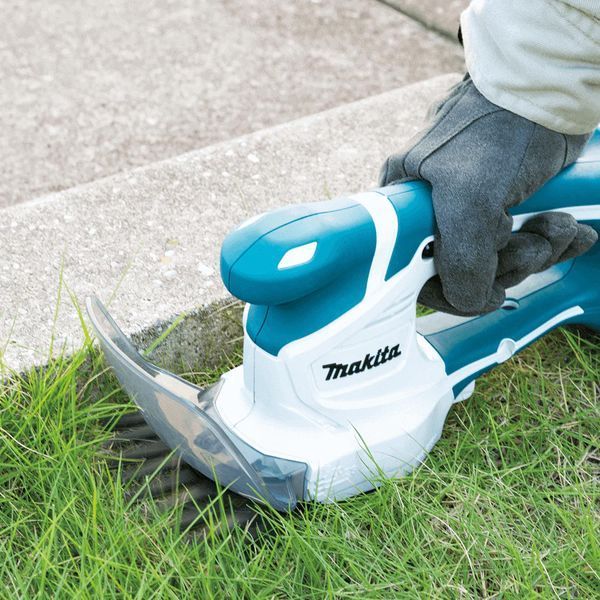 Професійні акумуляторні ножиці-кущоріз G-Series Makita (UM110DWYX) : з АКБ 18V 1.5 Ah, шина кущів/трави 200/110мм, щітковий UM110DWYX фото