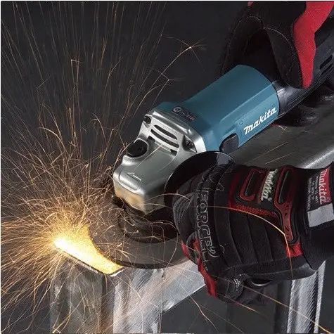Професійна кутова шліфувальна машина Makita 9558 HNG : 840 Вт, &Oslash; диска 125х22,23 мм, 11000 об/хв, вага 2.1 кг 9558HNG фото