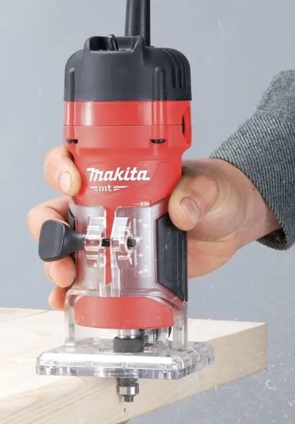Електричний ручний столярний фрезер Makita 3702 : 530 Вт, 6 цанга, 35000 об/хв електрофрезер 3702 фото