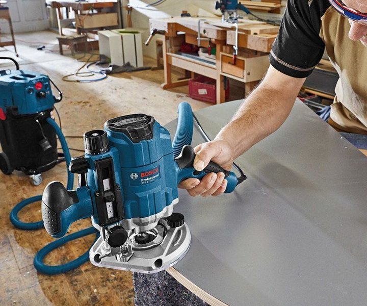Професійний фрезер Bosch Professional GOF 1250 CE : 1250 Вт, патрон&nbsp;6-8 мм, 24000 об/хв, вага 3.6 кг 0601626000 фото