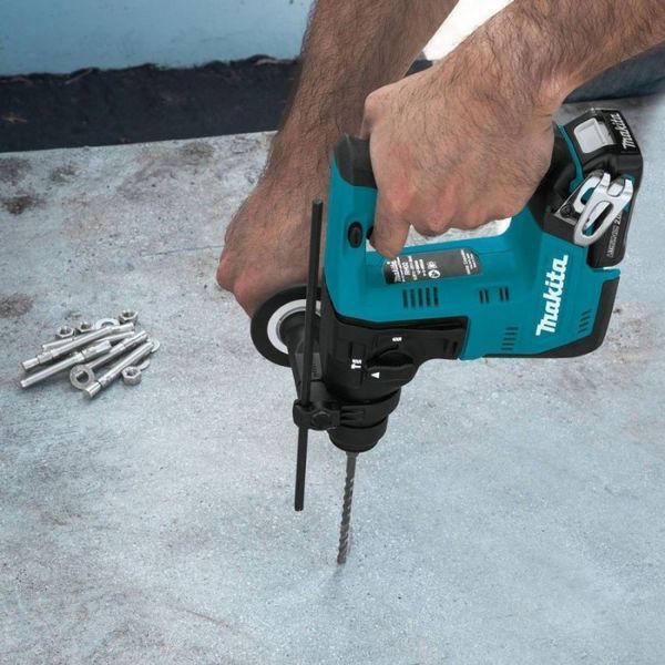 Професійний акумуляторний перфоратор Makita HR140DWAJ : 1.0 Дж, 10.8В (акум. 2шт 2ампера і зарядка) HR140DWAJ фото