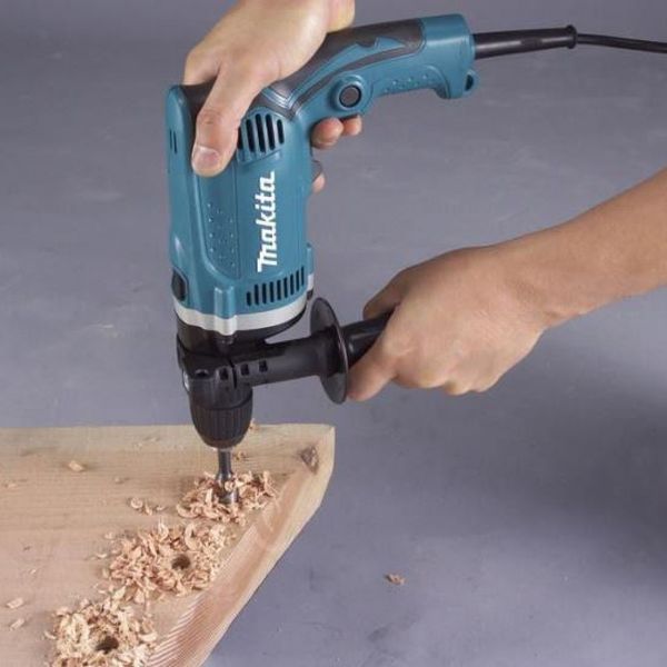 Професійна дриль електрична ударна (електродриль) MAKITA HP1631K : 710 Вт, 1.5-13мм сверло, 2 кг HP1631K фото